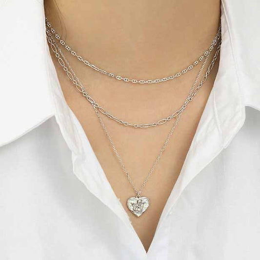The Art of Minimalist Layering: How to Stack Jewellery Without Overdoing It